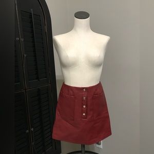 Red faux leather skirt